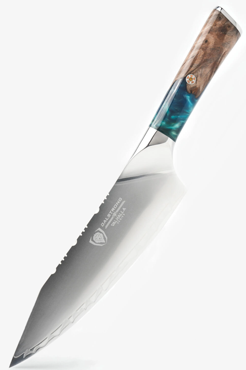 Valhalla chef's knife with a resin and burl wood handle on a pale backdrop